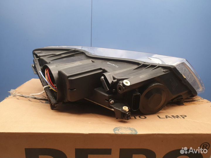 Фара левая Volkswagen Touareg 2002-2010