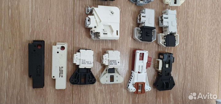 Устройство блокировки люка стиральной машины