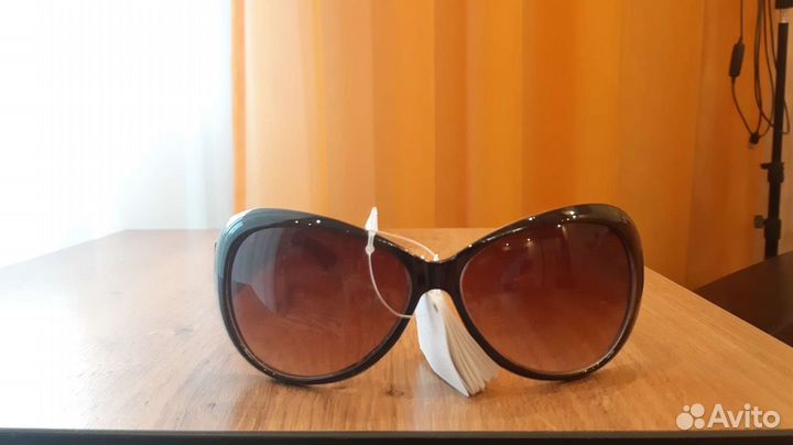Солнечные очки женские