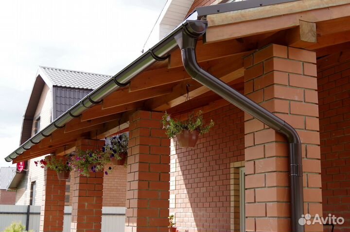 Водосточная система из металла и пластика