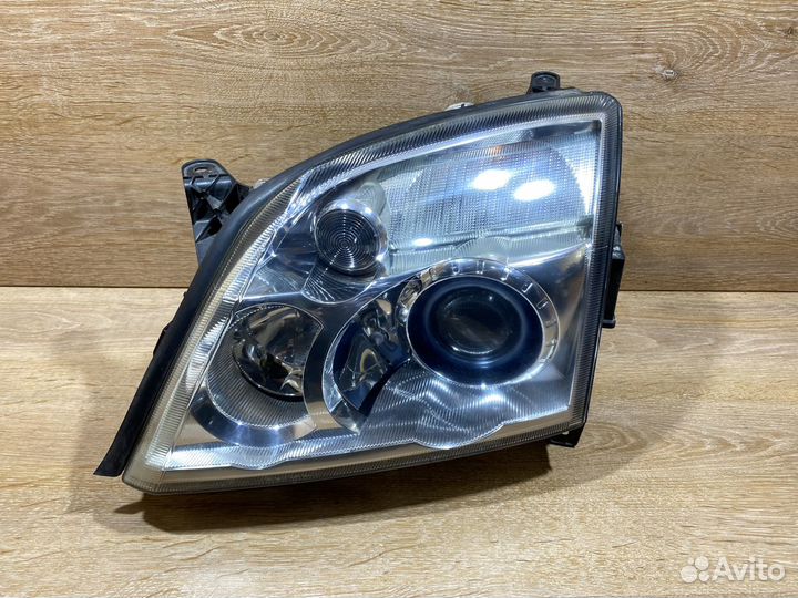 Фара левая Opel Vectra C дорест адаптивная 141059