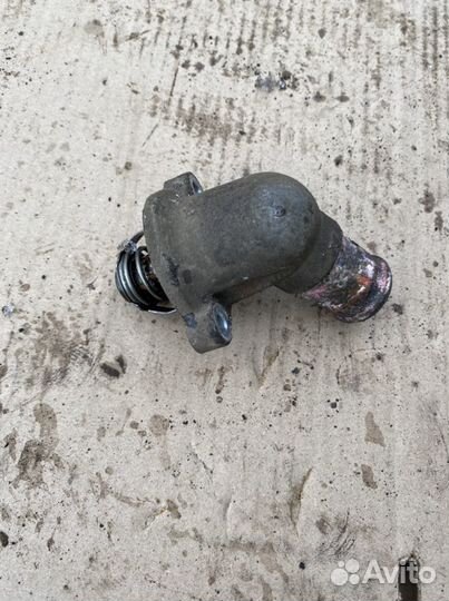 Корпус термостата Chevrolet Aveo T-250 1.2 8V