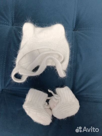 Вязаный комбинезон для новорожденного