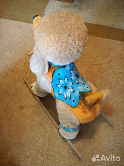 Собака—качалка