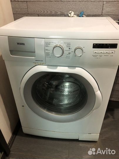 Стиральная машина с вертикальной загрузкой