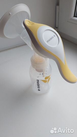 Молокоотсос medela ручной