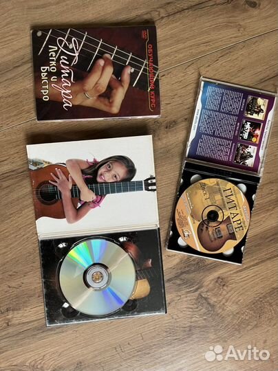 DVD диски, игра на гитаре