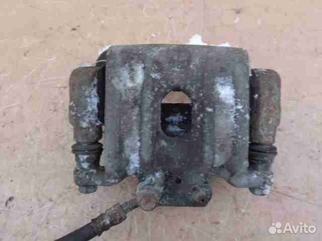 Суппорт задний левый Kia Sorento 2 XM