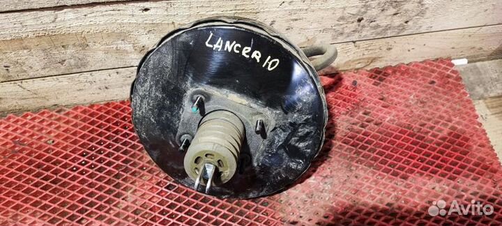 Вакуумник тормозной Mitsubishi Lancer