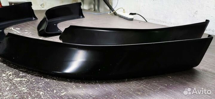 Клыки переднего бампера Лансер 10 рестайлинг