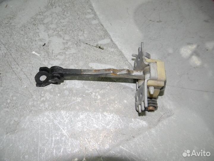 Ограничитель двери задней Fluence