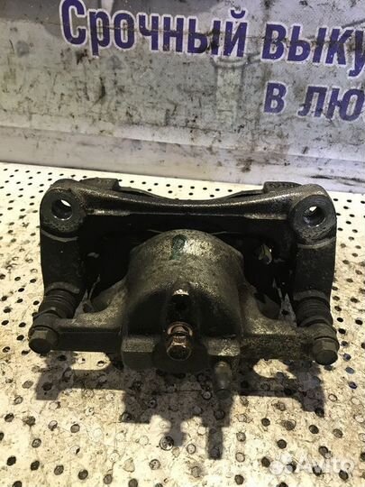 Суппорт тормозной передний левый Mazda CX-5