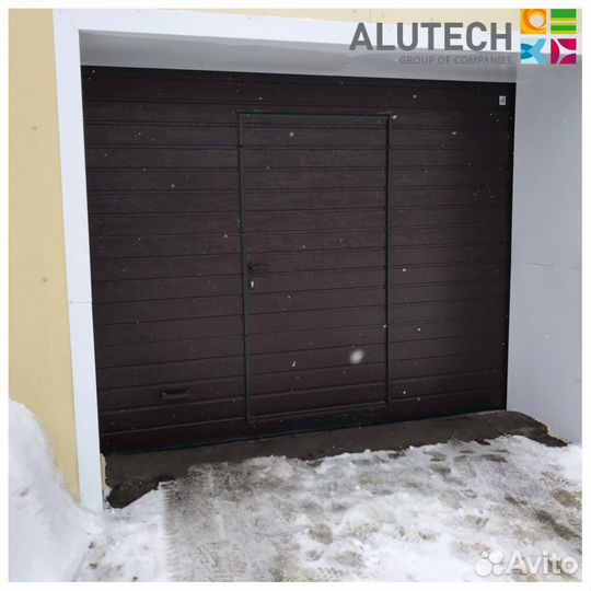 Секционные ворота для гаража alutech