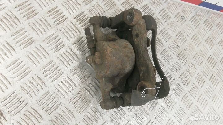 Суппорт передний правый Nissan X-Trail T31 2009