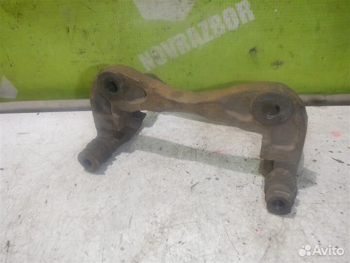 Скоба суппорта переднего Хендай Лантра 96-00