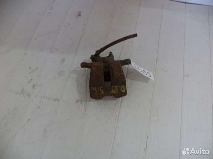 Суппорт задний правый Land Rover Discovery 3