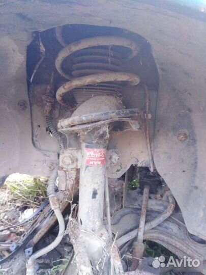 Амортизатор передний Ford Fiesta 4 1998