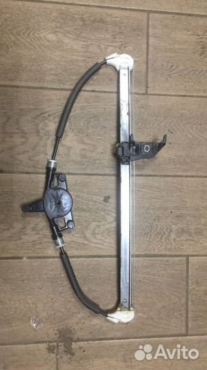 Стеклоподъемник электрический задний левый Mazda 3