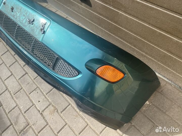 Передний бампер Ford Focus 1