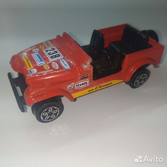 Модель Jeep Cj7 - Bburago 1:43