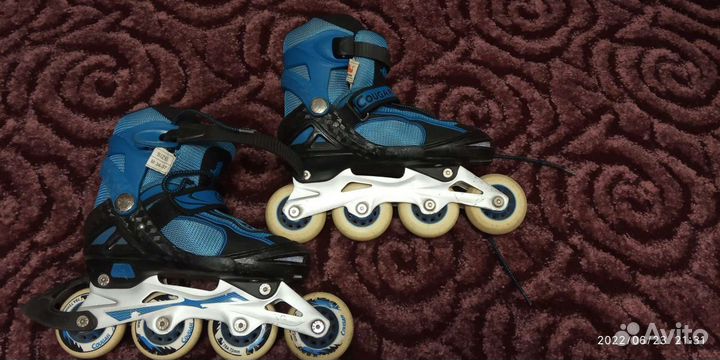 Роликовые коньки