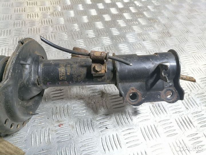 Стойка амортизатора п.л. Hyundai Solaris