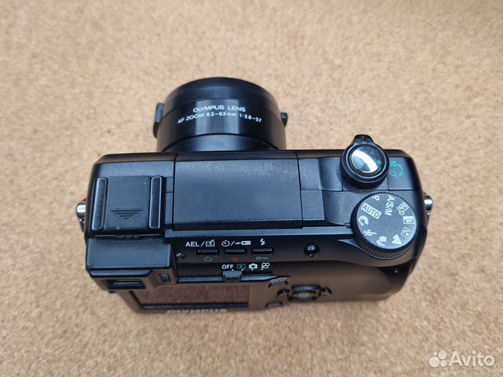 С оригинальным кожаным чехлом Olympus c-770 ultra