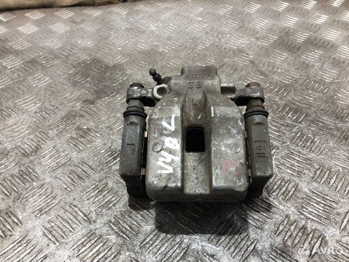 Суппорт тормозной задний левый Toyota Camry V40