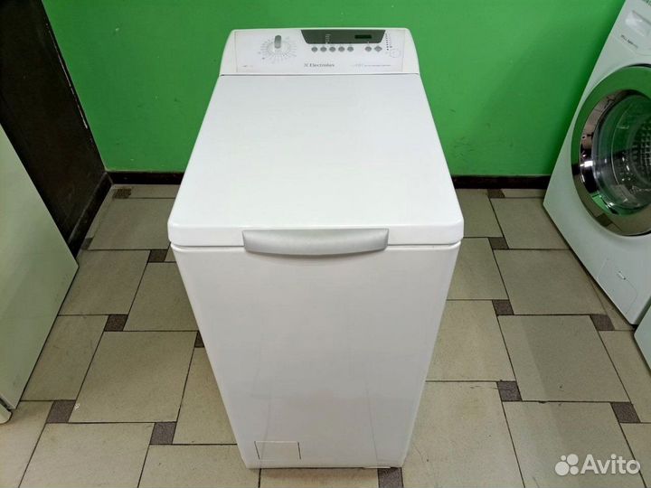 Машина с вертикальной загрузкой бу. Electrolux