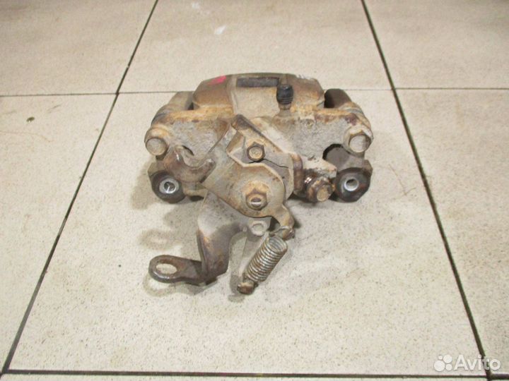 Суппорт задний левый Mitsubishi Outlander (GF)