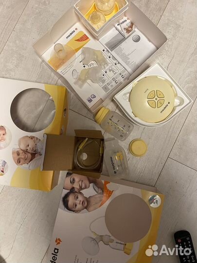 Молокоотсос medela электрический