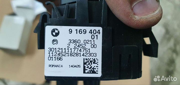 Коммутационный центр в рулевой колонке bmw