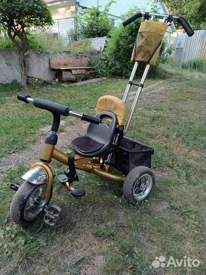 Трехколесный велосипед с ручкой