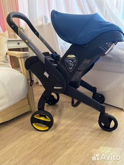 Автокресло коляска Doona+ с базой isofix