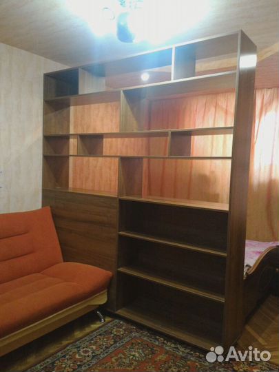 Стеллаж. Подойдёт для зонирования комнаты