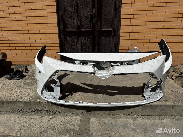 Бампер передний toyota corolla е210