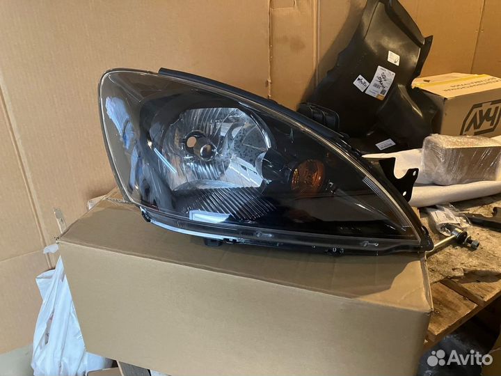 Фара черная MMC Lancer 9