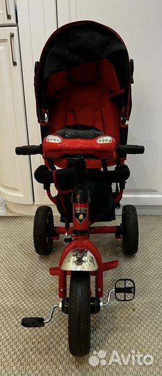 Трехколесный велосипед с ручкой