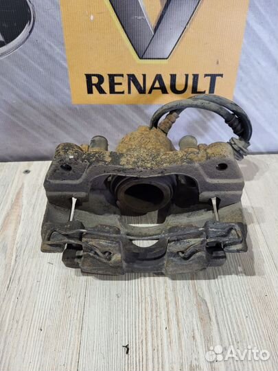 Суппорт тормозной перед Renault scenic 3 Прав