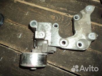 Натяжитель ремня грм