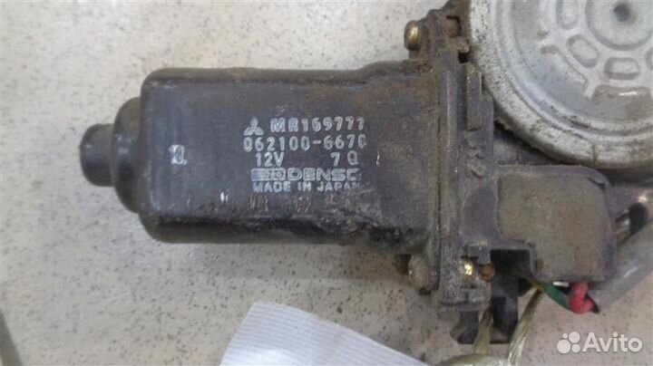 Моторчик стеклоподъемника задний левый Mitsubishi