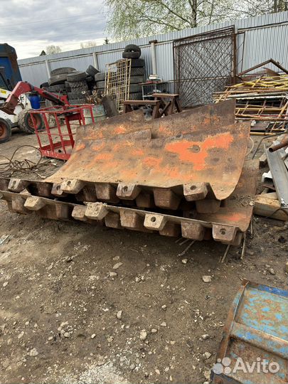 Кулачковый бандаж на грунтовой каток