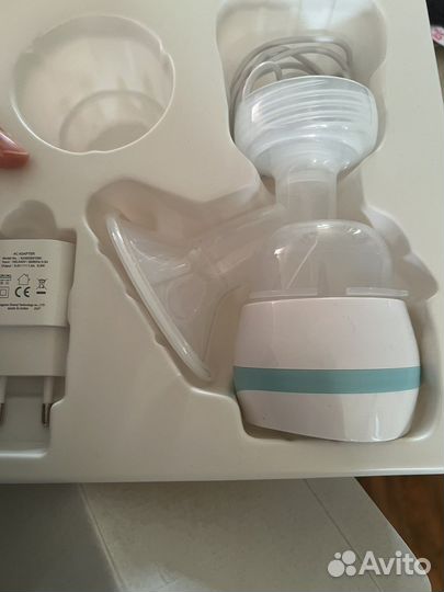 Молокоотсос электрический новый