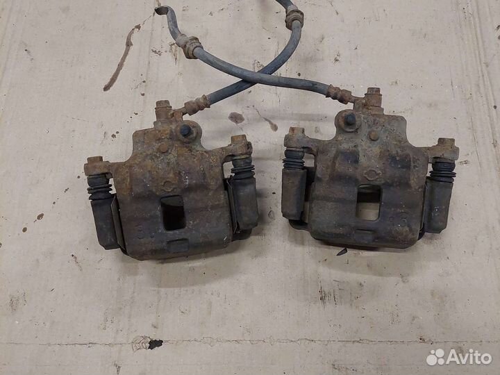 Суппорт передний Nissan Almera N15