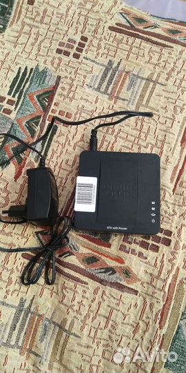 Адаптер для VoIP телефонии