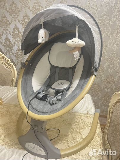 Электрокачели