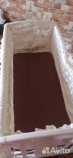 Детская кроватка с поперечным маятником