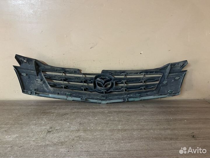 Решетка радиатора Mazda Demoo DW3W