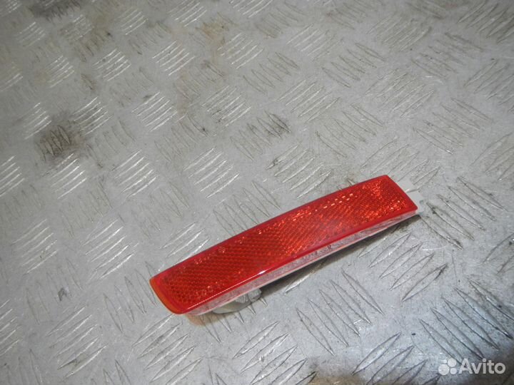 Отражатель в бампер задний левый, Nissan (Ниссан)