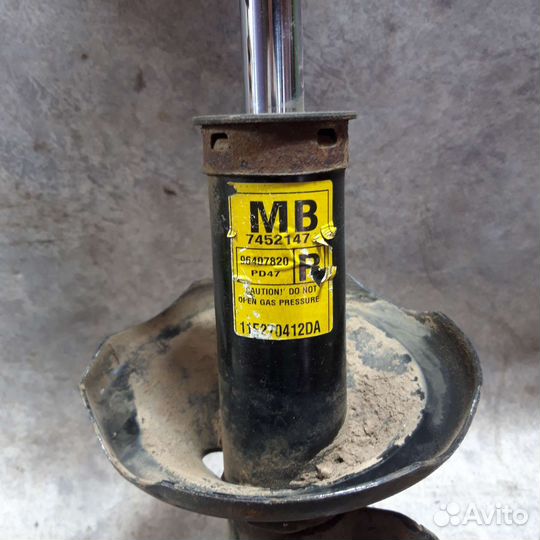 Амортизатор передний левый правый Шевроле Лачетти